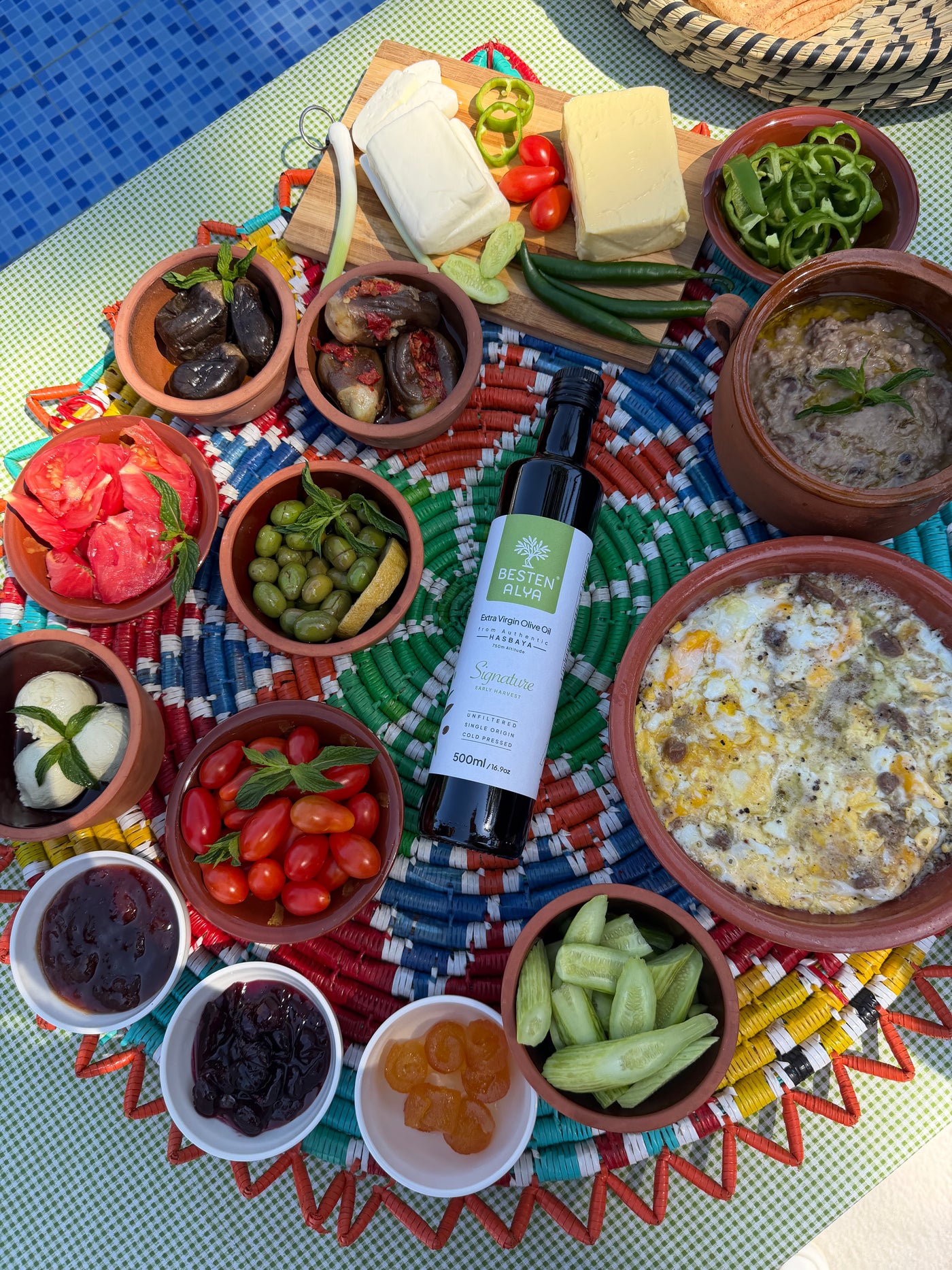 A Lebanese table of mezze with a bottle of Besten Alya olive oil